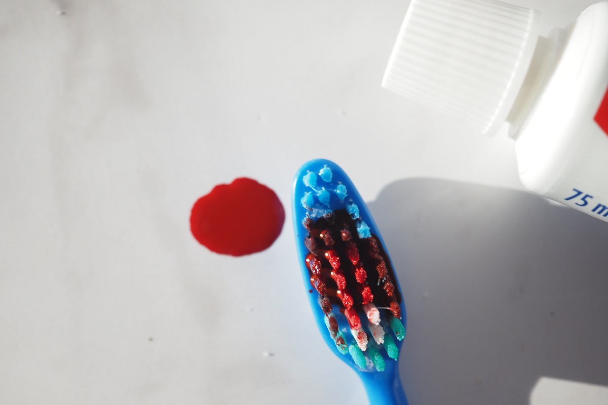 Why am I tasting blood after tooth extraction